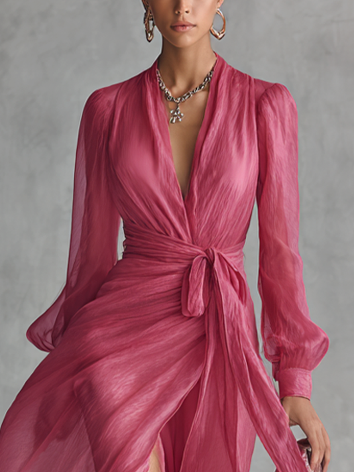 Elegant long women's dress in pearl pink chiffon with V-neck and waist belt