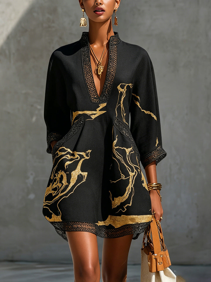 Donatella | Mini dress in black with golden marble print and crochet lace
